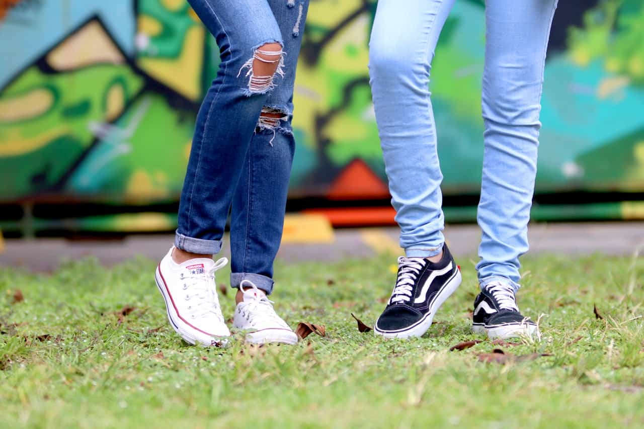 woman wearing CUFFED JEANS