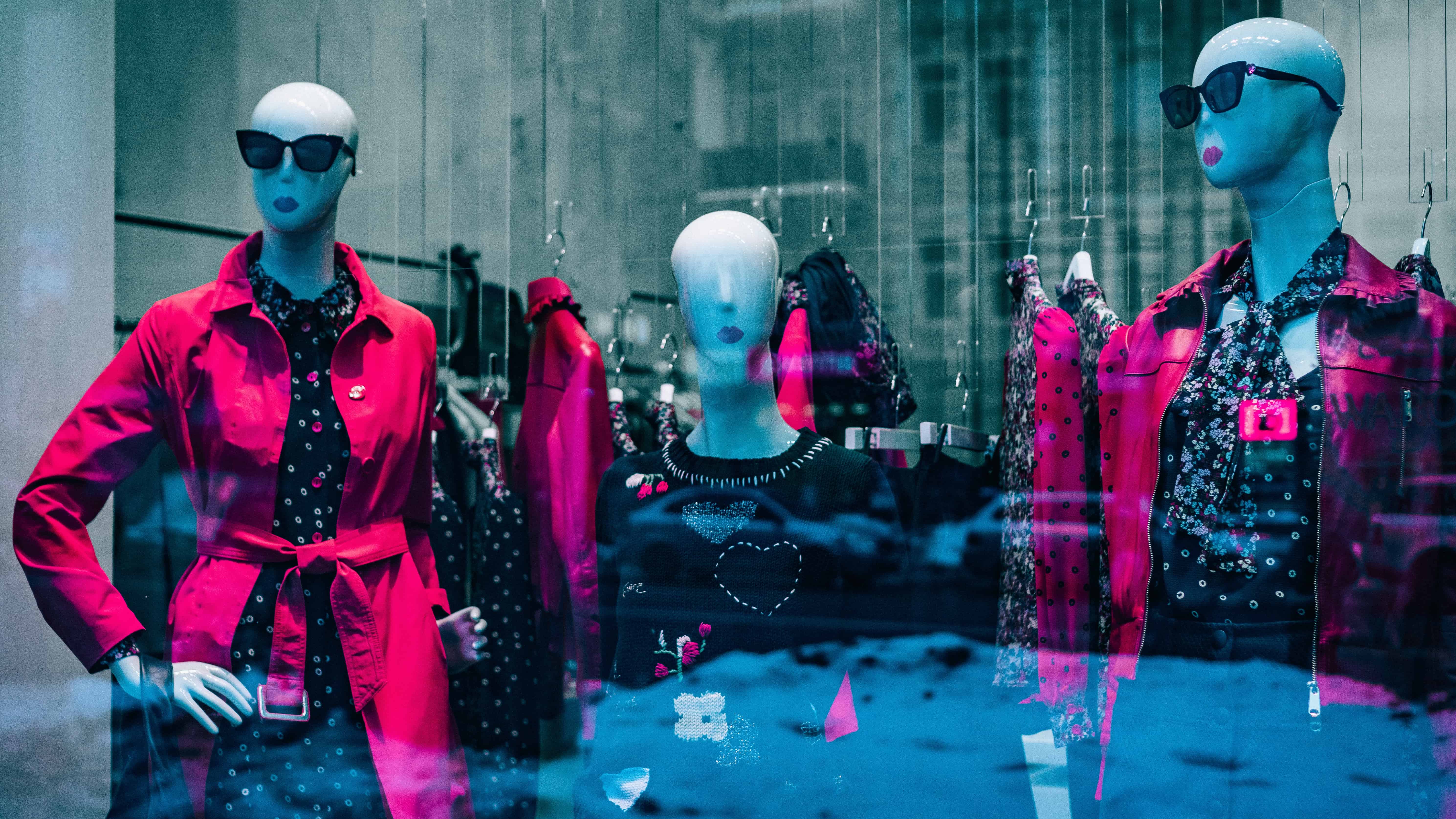 mannequin wearing shades red notched suit jacket