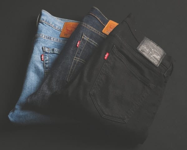 folded assorted jeans